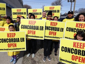 Jim Maloway (centre), the NDP MLA for Elmwood, stands with people rallying to save the Concordia Hospital emergency room outside the Elmwood Curling Club on Sun., April 23, 2017. Concordia is one of four community hospitals whose ER doctors have been informed that their positions will soon be deleted and have been invited to re-apply for new positions, according to a letter from Dr. Alecs Chochinov, the Winnipeg Regional Health Authority's head of emergency medicine, obtained by the Winnipeg Sun. Kevin King/Winnipeg Sun/Postmedia Network