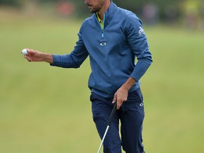 Rafa Cabrera Bello of Spain after putting on the 1st hole during day four of the Scottish Open at Dundonald Links, Troon, Scotland, Sunday July 16, 2017. (Mark Runnacles/PA via AP)
