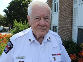 Kingston Police Community Volunteer Herb Pangborn, at his home on Saturday, received the Governor General of Canada Sovereign's Medal for Volunteers on July 11. (Steph Crosier/The Whig-Standard)