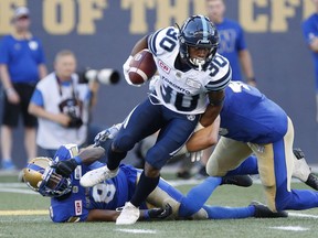 Toronto Argonauts' Martese Jackson (30) returns a Winnipeg Blue Bombers' kick for the touchdown during the first half of CFL action in Winnipeg Thursday, July 13, 2017. (THE CANADIAN PRESS/John Woods)