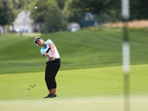 Canada's Brooke Henderson hits onto the first green during the final round of the U.S. Women's Open Golf tournament Sunday, July 16, 2017, in Bedminster, N.J. (AP Photo/Julie Jacobson)