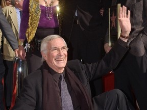 Actor Martin Landau waves to fans during a ceremony to honor him with a star on the Hollywood Walk Of Fame December 17, 2001 in Hollywood, CA. (Photo by Vince Bucci/Getty Images)