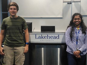 Taylor Bertelink/The Intelligencer
Fraser Moodey and Sruthi Amalan stand next to a SHAD Speaks podium at Lakehead University in Thunder Bay on July 14. The students receive lectures in areas such as, kinesiology, natural resources, marketing and much more during their time at camp.