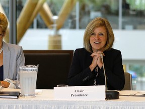 Alberta Premier Rachel Notley (right) met with her fellow provincial leaders, including Ontario Premier Kathleen Wynne (left), and Indigenous leaders in Edmonton on Monday July 17, 2017. Assembly of First Nations National Chief Perry Bellegarde, Inuit Tapiriit Kanatami President Natan Obed and Métis Nation President Clément Chartier did not attend, citing a “number of concerns about the structuring” of the meeting. LARRY WONG/POSTMEDIA