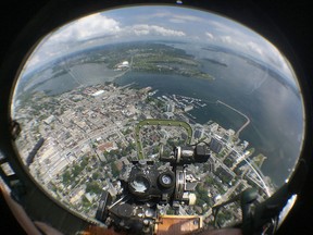 Elliot Ferguson/The Whig-Standard
Downtown Kingston is seen from Sentimental Journey. a restored Boeing B-17G Flying Fortress. Flown by the Commemorative Air Force from Airbase Arizona, it touched down at Norman Rogers Airport Monday for a week-long series of tours and flights.