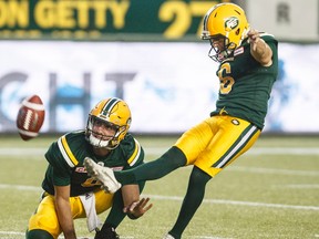 Edmonton Eskimos' Sean Whyte (6) makes the field goal as Danny O'Brien (9) places the ball, against the Ottawa Redblacks during second half CFL action in Edmonton, Alta., on Friday July 14, 2017.