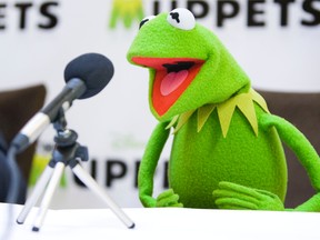 Kermit the Frog poses for a photo after a press conference at the Windsor Arms Hotel in Toronto on Tuesday October 25, 2011. (Ernest Doroszuk/Toronto Sun)