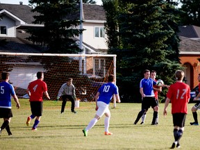 Soccer teams play a game in Henderson Park, 3408 Riverbed Road, in Edmonton Monday July 17, 2017. Photo by David Bloom