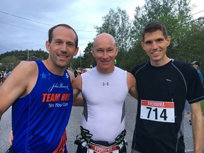 Local runners, Joe Perry, centre, and Bryan Cowden, right, ran the Massey marathon on Sunday. Pictured with them is their friend Adam Rundell from Massachusetts, who helped pace Cowden to his qualifying time.