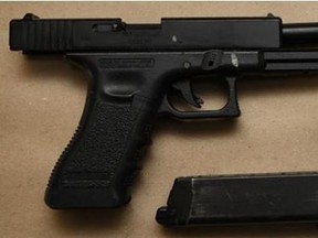 Toronto police arrested five men, including one Londoner, and seized three guns and a car Saturday. (Police supplied photo)
