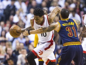 Raptors' DeMar DeRozan in action against Cavaliers' Deron Williams during the NBA's Eastern Conference semifinals at the Air Canada Centre in Toronto on May 5, 2017. The NBA is scrapping home and road uniforms starting next season. (Ernest Doroszuk/Toronto Sun)