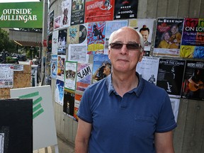 Chuck McEwen, the executive producer of the Winnipeg Fringe Festival, stands outside the Royal Manitoba Theatre Centre on Market Avenue in Winnipeg on Tues., July 18, 2017. Kevin King/Winnipeg Sun/Postmedia Network