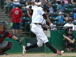 Winnipeg Goldeyes 3B Wes Darvill hits a single in the sixth inning of American Association action against the Lincoln Saltdogs at Shaw Park in Winnipeg on Sun., June 4, 2017. Kevin King/Winnipeg Sun/Postmedia Network