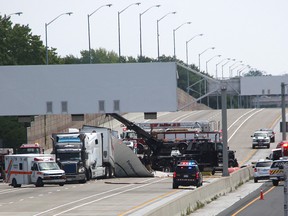 One person was killed after a collision involving three transport trucks on Highway 402 in Sarnia Wednesday. Traffic was diverted at Highway 40 following the crash. (Tyler Kula/Sarnia Observer)