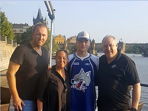 Zack Malik (second from right), signed with the Sudbury Wolves in his native Czech Republic this week, flanked by his parents on the left and Sudbury Wolves GM Rob Papineau on the right. Supplied photo