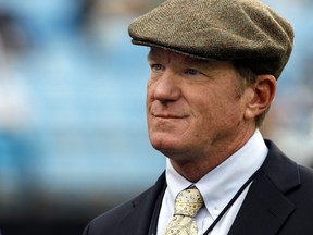 This Oct. 7, 2012, file photo shows Carolina Panthers general manager Marty Hurney watching the Panthers warm up before an NFL football game against the Seattle Seahawks, in Charlotte, N.C. (AP Photo/Nell Redmond, File)