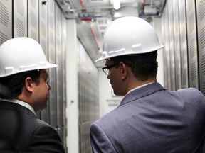 Mayor Christian Provenzano and Convergent Energy CEO Johannes Rittershausen tour the new 7 MW energy storage project in Sault Ste. Marie. The Independent Electricity System Operator will monitor over the next three years how the technology stores energy until its needed on the grid.