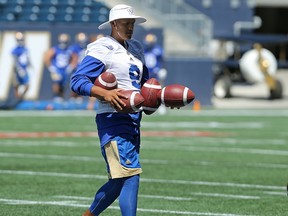 Kicker Justin Medlock collects footballs during Winnipeg Blue Bombers practice on Tues., July 18, 2017. Kevin King/Winnipeg Sun
