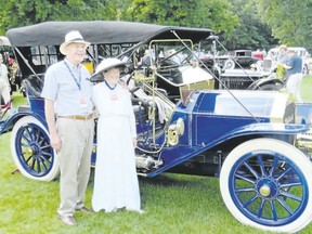 This couple shows off their classy chassis at the Concours d'Elegance of America. (JIM FOX, Special to Postmedia News)