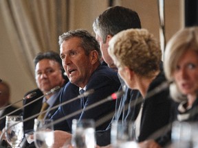 Manitoba Premier Brian Pallister speaks during the final press conference at the Council of Federation meetings in Edmonton Alta, on Wednesday July 19, 2017. THE CANADIAN PRESS/Jason Franson