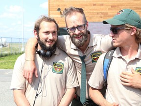 Ministry of Natural Resources and Forestry fire rangers Eli Burley, left, Esa Keltamaki and Alexander Prevost prepare to deploy from the Greater Sudbury Airport to British Columbia on Wednesday July 19, 2017. About 100 fire rangers and support staff headed to BC to help fight fires. John Lappa/Sudbury Star/Postmedia Network