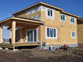 A house under construction in Abasand in Fort McMurray, Alta. on Thursday, Feb. 16, 2017. Cullen Bird/Fort McMurray Today/Postmedia Network