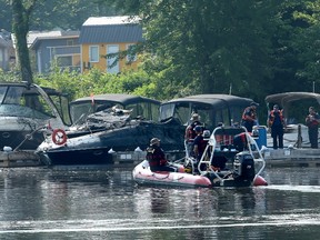 Firefighters are on the scene of boat fires at the Petrie Island marina Thursday (July 20, 2017) morning. Three boats were affected: one burnt and sank, another was burnt beyond repair (in picture) and another, beside that, suffered damage.