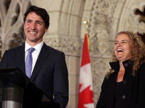 Prime Minister Justin Trudeau shares a laugh with former astronaut, and Governor General designate, Julie Payette, on Parliament Hill, in Ottawa, Thursday July 13, 2017. THE CANADIAN PRESS/Fred Chartrand