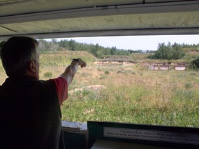 Photo by Jake Wray Reporter/Examiner
Bill Newton, spokesperson for the Spruce Grove Gun Club, points down the club’s rifle range. Homeowners beyond the range have complained of stray bullets.
