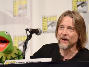 In this July 11, 2015, file photo, Kermit the Frog, left, and puppeteer Steve Whitmire attend "The Muppets" panel on day 3 of Comic-Con International in San Diego. Whitmire said on NBC's "Today" show Thursday, July 20, 2017, that his firing as Kermit's performer came as “a complete shock.” (Photo by Tonya Wise/Invision/AP, File)