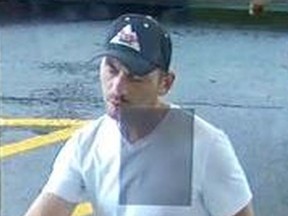 Investigators need help identifying a man who is suspected of impersonating a police officer before stealing a 91-year-old man's car from a Don Mills gas station and running the senior down as he drove off away on Tuesday, July 18, 2017. (TORONTO POLICE/HANDOUT)