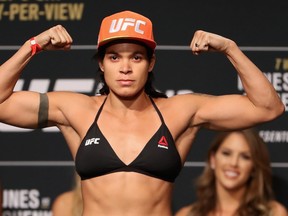 Amanda Nunes of Brazil poses on the scale during the UFC weigh-in at the Park Theater on July 7, 2017 in Las Vegas, Nevada.