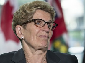 Premier Kathleen Wynne speaks during an event in Toronto on Wednesday, June 14, 2017. (CRAIG ROBERTSON/TORONTO SUN)