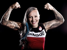 Two-time Olympic gold medalist Kaillie Humphries poses for photos during Team Canada's Olympic Summit at the Telus Convention Centre in Calgary on June 4, 2017. (Leah Hennel/Postmedia)