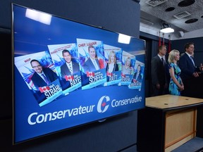 Leader of the Official Opposition and Leader of the Conservative Party of Canada, Andrew Scheer, makes an announcement and holds a media availability as he stands with his team at the National Press Theatre in Ottawa on Thursday, July 20, 2017. THE CANADIAN PRESS/Sean Kilpatrick