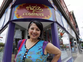 Sheena Zain, owner of Aziz & Company, in front of her store at the corner of Bank and Gilmour Sts. DARREN BROWN /POSTMEDIA