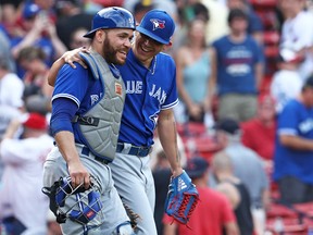 Roberto Osuna of the Toronto Blue Jays celebrates with Russell Martin after defeating the Boston Red Sox at Fenway Park on July 20, 2017. (Maddie Meyer/Getty Images)