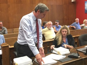 BRUCE BELL/THE INTELLIGENCER Prince Edward County solicitors Wayne Fairbrother and Samantha Foster prepare for Day 2 of an Ontario Municipal Board hearing at Shire Hall on Thursday morning. Local resident Pierre Klein is appealing a 2016 bylaw to combine Bloomfield and Hallowell for election purposes.