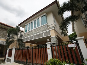 One of properties of AlphaBay founder Alexandre Cazes is seen in Bangkok, Thailand, Friday, July 21, 2017. The young Canadian Cazes accused of masterminding AlphaBay, the world's leading "darknet" internet marketplace, lived an apparently quiet life for nearly two years with his Thai girlfriend in a middle-class neighborhood on the outskirts of Bangkok. (AP Photo/Sakchai Lalit)