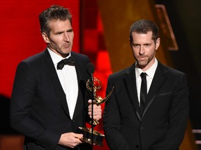 In this Sept. 20, 2015 file photo, creator-showrunners David Benioff, left, and D.B. Weiss accept the award for outstanding writing for a drama series for "Game Of Thrones" at the 67th Primetime Emmy Awards in Los Angeles. HBO’s announcement, Wednesday, July 19, 2017, that Benioff and Weiss will follow "Game of Thrones" with an HBO series in which slavery remains legal in the modern-day South drew fire on social media from those who fear that a pair of white producers are unfit to tell that story and that telling it will glorify racism. The series, “Confederate,” will take place in an alternate timeline where the southern states have successfully seceded from the Union and formed a nation in which legalized slavery has evolved into a modern institution. (Chris Pizzello/Invision/AP, File)