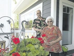 Mary Thomas came to Canada in the 1960s when immigration rules changed and with her husband Chacko, who came later, built a life in Edmonton. (Ian Kucerak/Postmedia Network)