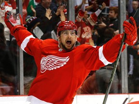 Detroit Red Wings left winger Tomas Tatar celebrates his goal against the Boston Bruins in the second period of an NHL hockey game on Nov. 25, 2015. (AP Photo/Paul Sancya)