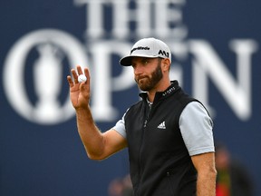 Dustin Johnson of the United States acknowledges the crowd on the 18th green during the second round of the 146th Open Championship at Royal Birkdale on July 21, 2017 in Southport, England. (Dan Mullan/Getty Images)