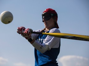 Toronto Blind Jays' Meghan Mahon bats a practice session in Toronto on Tuesday July 18, 2017. (THE CANADIAN PRESS/Chris Young)