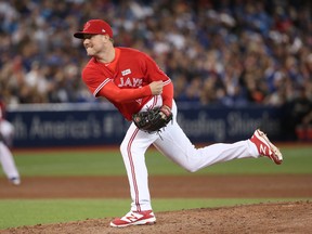Joe Smith of the Toronto Blue Jays delivers a pitch in the eighth inning during MLB game action against the New York Yankees at Rogers Centre on June 4, 2017. (Tom Szczerbowski/Getty Images)