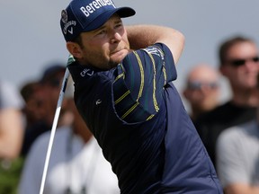 South Africa's Branden Grace plays a tee shot during the third round of the British Open Golf Championship, at Royal Birkdale, Southport, England, Saturday July 22, 2017. (AP Photo/Alastair Grant)