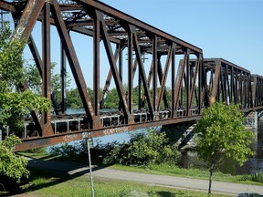 The fenced-off Prince of Wales Bridge across the Ottawa River is featured in the Moose Consortium proposal for interprovincial rail service.