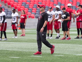 Coach Rick Campbell watches practice as the Ottawa Redblacks practice at TD Place. (Wayne Cuddington/ Postmedia)