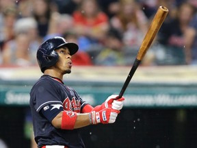 Cleveland Indians' Francisco Lindor watches his solo home run off Toronto Blue Jays relief pitcher Danny Barnes in the tenth inning of a baseball game, Saturday, July 22, 2017, in Cleveland. (AP Photo/Tony Dejak)