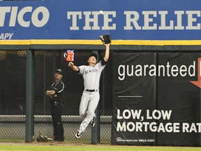 Rob Refsnyder #38 of the New York Yankees makes a catch on Alen Hanson #39 of the Chicago White Sox during the fourth inning on June 29, 2017 at Guaranteed Rate Field in Chicago, Illinois. (David Banks/Getty Images)